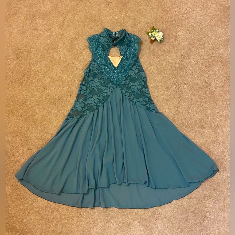 Whimsical sage green dance costume and flower hair piece